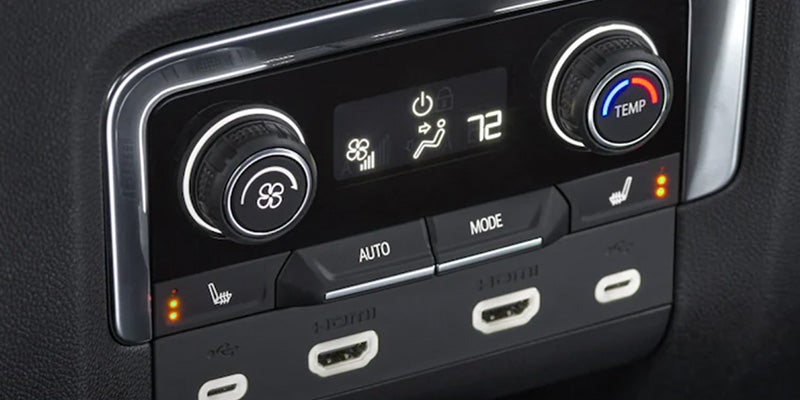 Image of the 2024 Chevrolet Tahoe's interior, featuring A/C controls